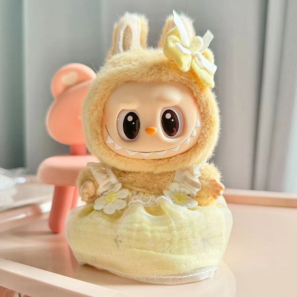 Labubu Yellow suspenders and small daisies.